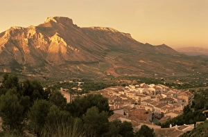 Velez Blanco nestled beneath the rocky peak of La Muela at sunset Velez Blanco nestled beneath the rocky peak of La Muela at sunset