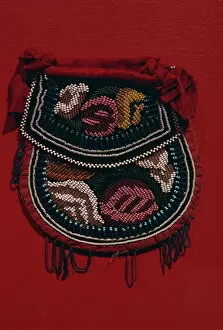 Single Object Collection: Velveteen and glass beads on pouch dating from 1850, of the Coughnawbga Mohawk of the Eastern