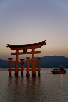 Vermillion coloured floating torii gate