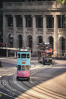 Graffiti Prints: An vertical shot of a Hong Kong Tram passing the colonial Old Supreme Court building