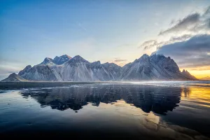 Vestrahorn Mountain with tidal reflections at sunrise, Southeast Iceland, Polar Regions Vestrahorn Mountain with tidal reflections at sunrise, Southeast Iceland, Polar Regions