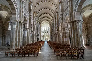 Columns Prints: Vezelay Abbey showcases its interior architecture and seating arrangement for visitors in France