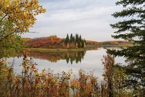 Alberta Prints: Vibrant autumn colors surround Astotin Lake in Elk Island National Park