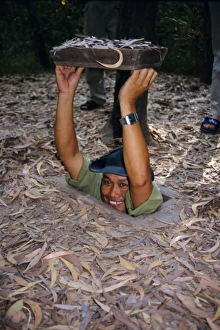 Vietnamese man entering tunnel