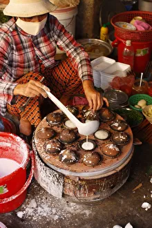 Street Vendors Prints: Vietnamese pancakes in a street market, Mui Ne, Bin Thuan, Vietnam, Indochina