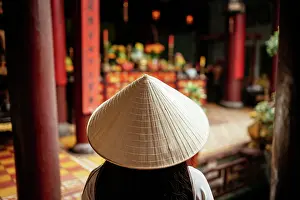 Ritual Prints: Vietnamese woman in ao dai at Quang Cong Temple, Hoi An, Quang Nam Province, Vietnam