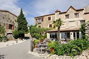 Chateau Prints: Vieux Chateau square in the village of Cabris features outdoor seating