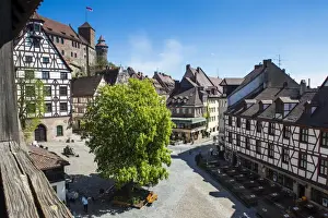 Flag Prints: View over the Albrecht Duerer square and the imperial castle of Nuremberg, Bavaria