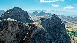 Valleys Prints: View of Alinja castle atop a mountain in Azerbaijan showcasing the rugged terrain and distant hills