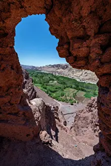 Canyon Prints: View from an ancient opening overlooking lush land near Shahr-e Zuhak in Bamiyan