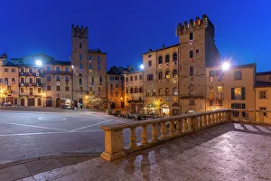 View of architecture in Piazza Grande at dusk, Arezzo, Province of Arezzo, Tuscany, Italy, Europe