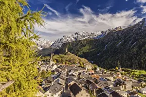 Lower Engadine Prints: View of Ardez village surrounded by woods and snowy peaks Lower Engadine