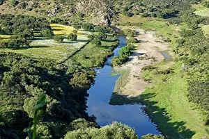 Alentejo Prints: View of Ardila River from Noudar Castle in Alentejo region of Portugal surrounded by green landscape