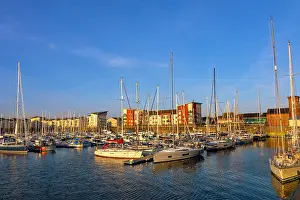 Yachting Prints: View of Ardrossan Marina with boats moored in the harbor under a clear blue sky in North Ayrshire