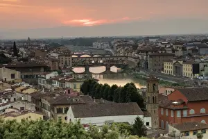 Pink Sky Prints: View of the Arno River and Ponte Vecchio at sunset from Piazzale Michelangelo, Florence
