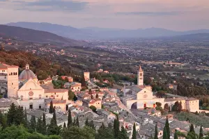 Assisi Prints: View over Assisi to Santa Chiara Basilica and San Rufino Cathedral at sunset, Assisi