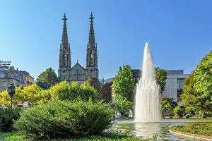 Black Prints: View of Augustaplatz Square with fountain and church in Baden-Baden during a sunny day in Baden-Württemberg