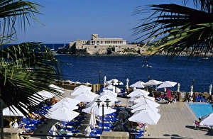Sun Shade Prints: View over bay and pool area of Corinthia San Gorg Hotel, St. George`s Bay
