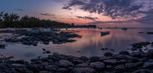 View of beach and Indian Ocean at dusk in Cap Malheureux, Mauritius, Indian Ocean, Africa