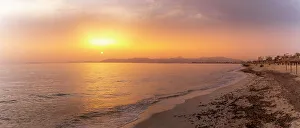 Beach Umbrellas Prints: View of beach at Playa de Palma at sunset