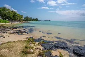 View of beach and turquoise Indian Ocean on sunny day in Cap Malheureux, Mauritius, Indian Ocean, Africa