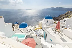 Traditionally Greek Gallery: View of blue domed churches from cafe in Oia village, Santorini, Aegean Island, Cyclades Island