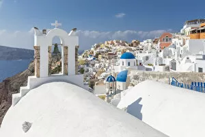 Typically Greek Gallery: View of blue domed churches and Oia village, Santorini, Aegean Island, Cyclades Island