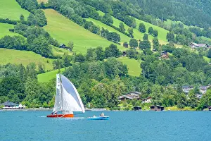 Time Prints: View of boat on Lake Zell from Zell am See and mountainous backdrop on a sunny day