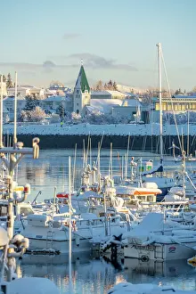 Vessels Prints: View of boats in Hafnarfjorour Marina and town in background in winter