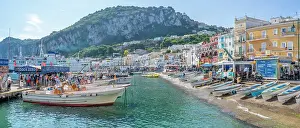 Graphic Prints: View of boats in Marina Grande overlooked by Capri Town in the background