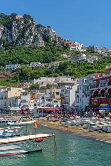 Green Hills Prints: View of boats in Marina Grande overlooked by Capri Town in the background