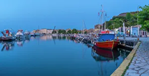 Boat Ride Prints: View of boats in the Old Port Marina at dusk