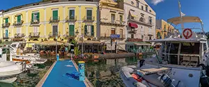 Outdoor Seating Prints: View of boats and restaurants in Porto d'Ischia (Port of Ischia)