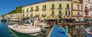 Waterfront Dining Prints: View of boats and restaurants in Porto d'Ischia (Port of Ischia)