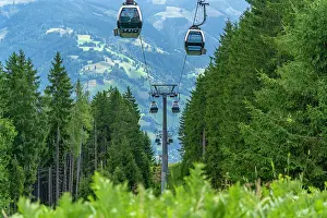Riding Prints: View of cable car at Mittelstation on a sunny day, Bruckberg, Salzburg, Austria, Europe