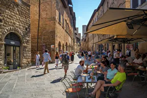 San Gimignano Prints: View of cafe and bar in narrow street in San Gimignano