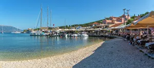 Eateries Prints: View of cafes and restaurants in Fiscardo harbour