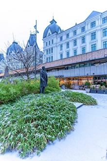 Oslo Prints: View of cafes and restaurants on Victoria Terrasse during winter