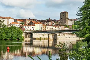 Waters Prints: View of Cahors along the Lot River with buildings and a bridge in the background during daytime in southwest France