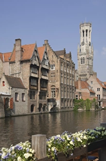 Brugge Prints: View over a canal of traditional Flemish gables and the Belfry