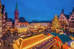 Hesse Prints: View of carousel and Christmas Market stalls at dusk