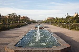 View along central res ervation gardens with foreground fountain, Avenue Mohammed VI