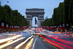 Arc De Triomphe Prints: View down the Champs Elysees to the Arc de Triomphe, illuminated at dusk, Paris, France