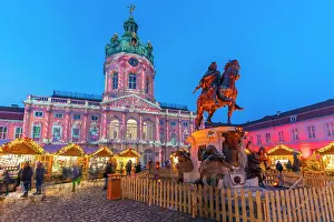 Popular Prints: View of Christmas market at Charlottenburg Palace in Schloss Charlottenburg at dusk