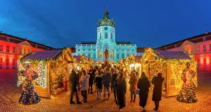 Stands Prints: View of Christmas market at Charlottenburg Palace in Schloss Charlottenburg at dusk