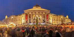 Westminster Prints: View of Christmas market and The National Gallery in Trafalgar Square at dusk