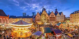 Adults Prints: View of Christmas Market on Roemerberg Square from elevated position at dusk