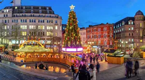 Public Square Prints: View of Christmas Market stalls in Victoria Square at dusk