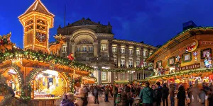 Public Square Prints: View of Christmas Market stalls in Victoria Square at dusk