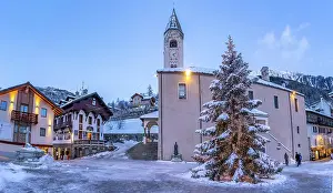 Courmayeur Prints: View of Christmas tree and Church of Saint Pantalon in Piazza Abbe Henry at dusk